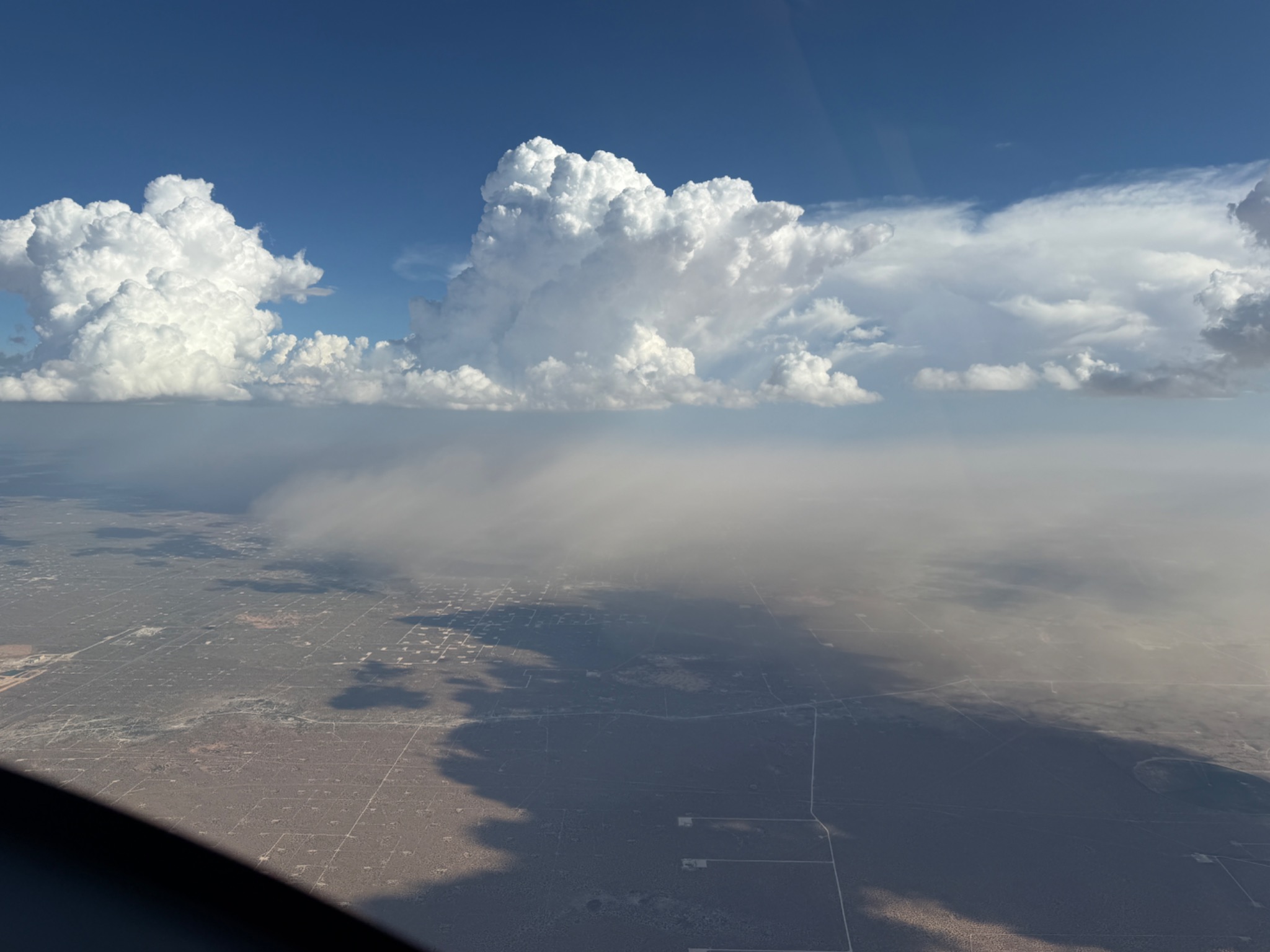 Towering convective cloud formations viewed in flight